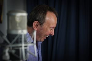 Behind Mic laughing Lo Res copy